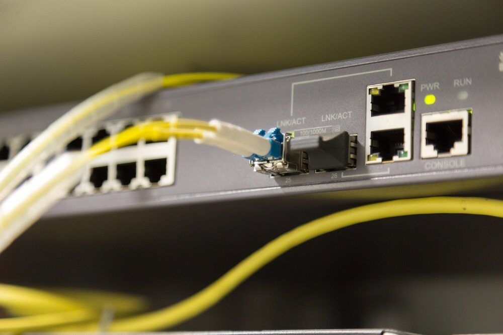 A Bunch of Wires Are Connected to a Server — DGC Tech Solutions In Mareeba, QLD