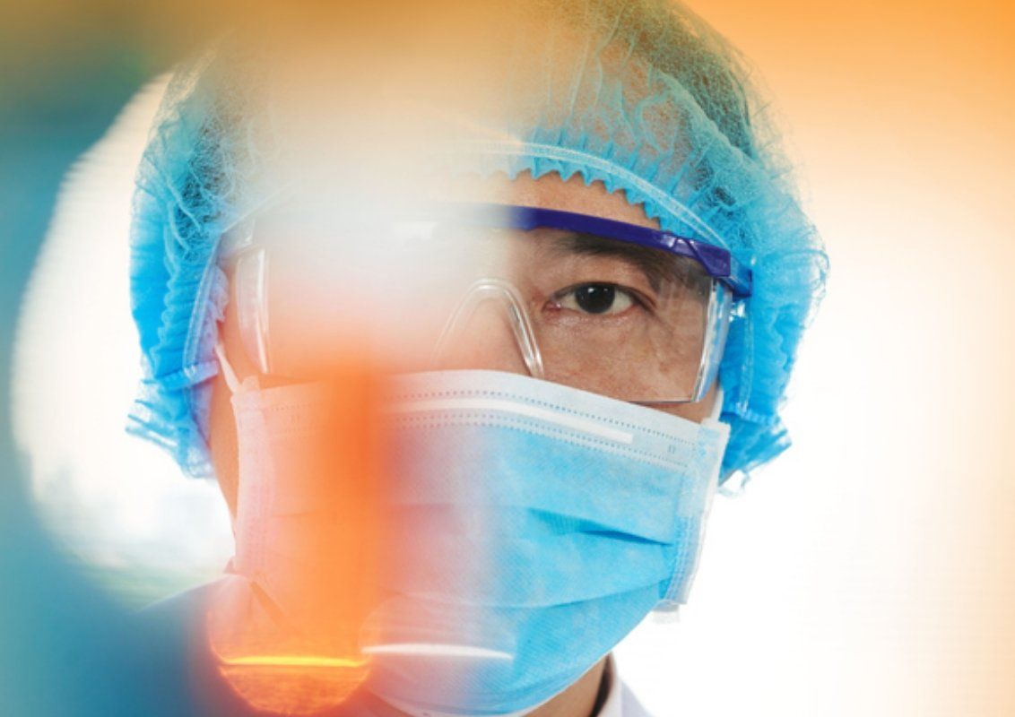A closeup of male scientist