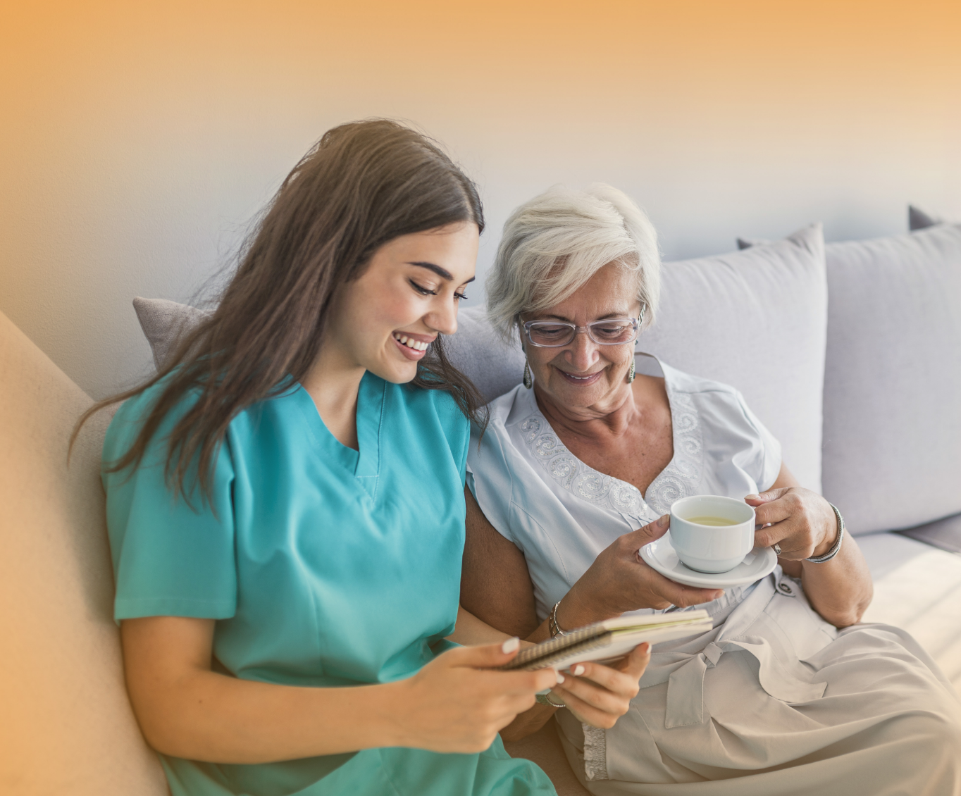 A nurse is reading to a patient.