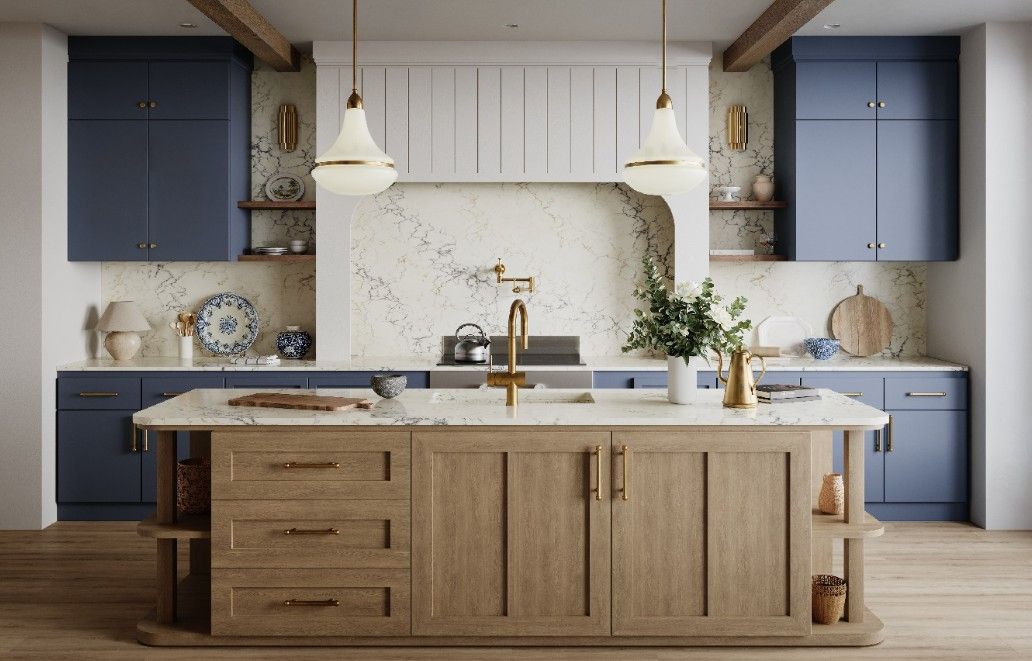 A modern kitchen with blue and wood cabinets, a marble backsplash, and a wooden island.