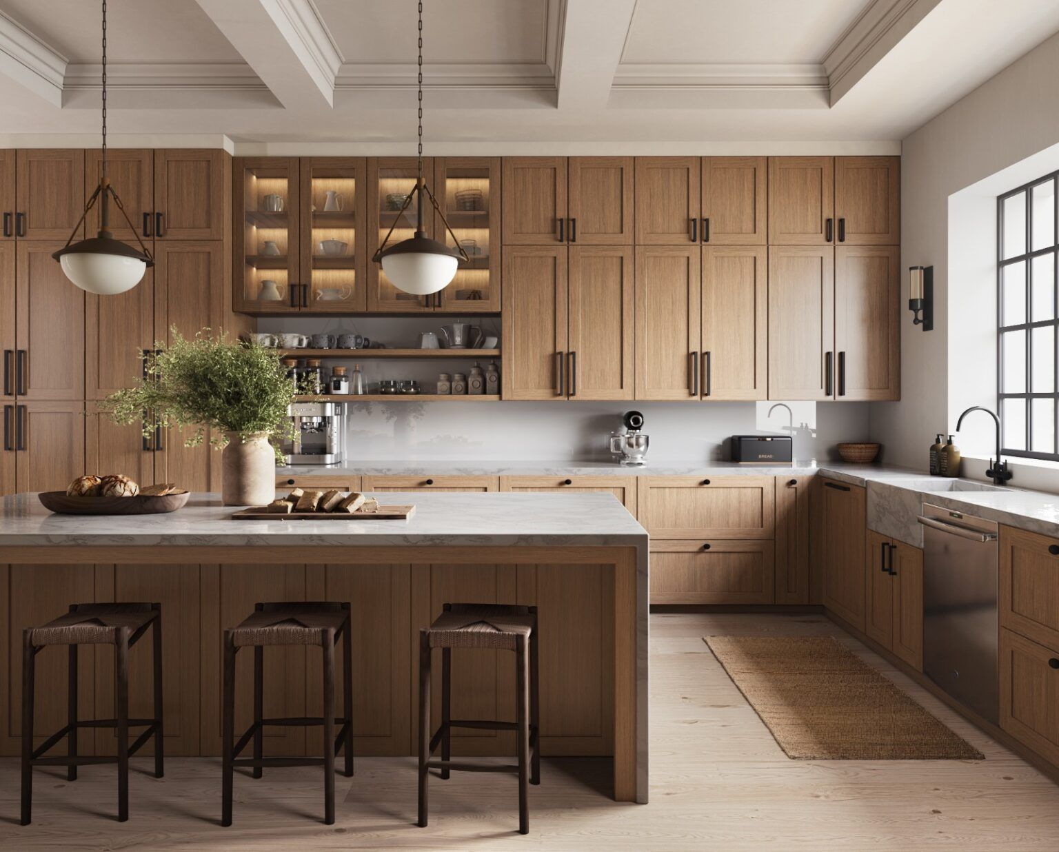 Light wood kitchen with island, cabinets, and pendant lights. Bar stools and flowers on countertop.