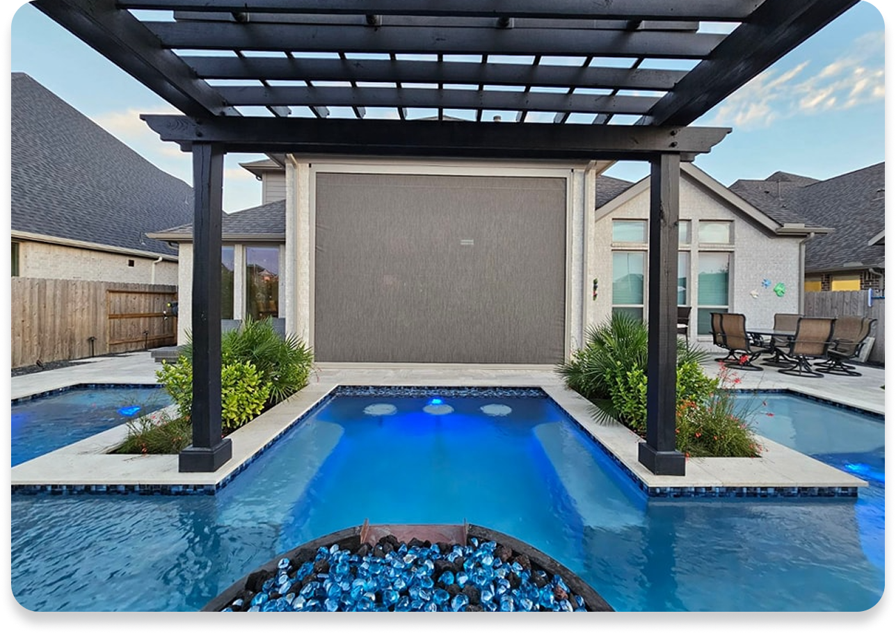 A large swimming pool with a pergola over it