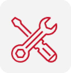 A wrench and screwdriver crossed over each other on a white background.