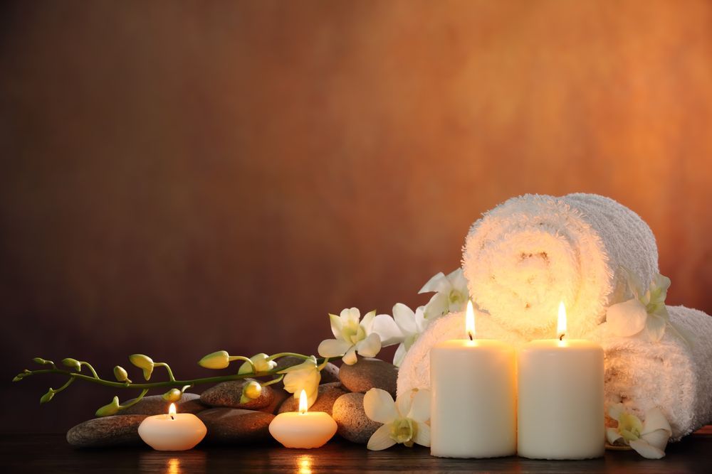 Young Woman Having Stone Massage in Spa Salon — Massage Therapy in Kirwan, QLD