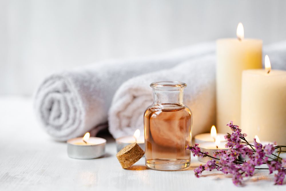 Close-Up Partial View of Woman Having Hot Stone Massage in Spa Salon — Massage Therapy in Kirwan, QLD