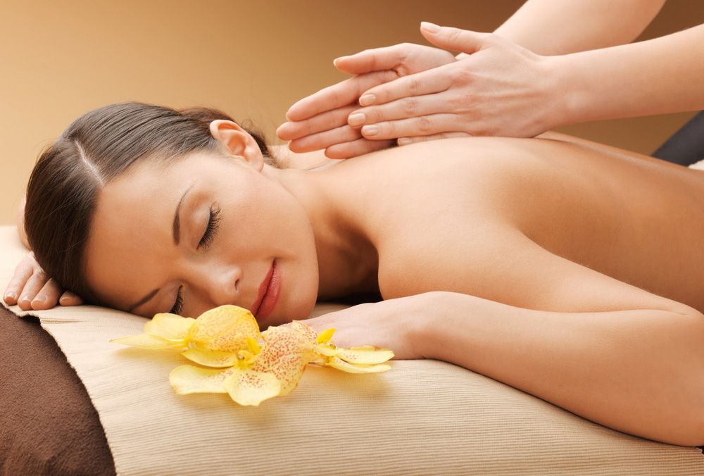 Picture of Happy Beautiful Woman in Massage Salon — Massage Therapy in Kirwan, QLD