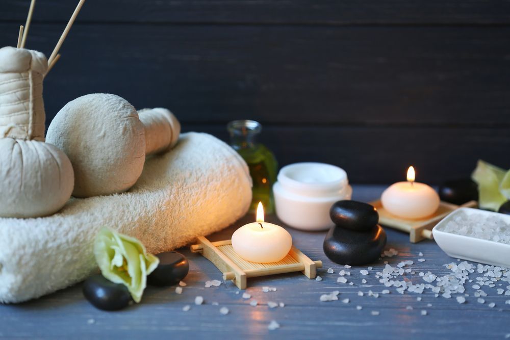 Therapist Checking Man's Back for Injury — Massage Therapy in Kirwan, QLD