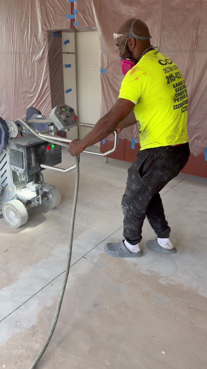 Diamond grinding and repairing a concrete floor