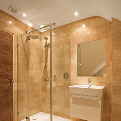 shower renovation with lights installed