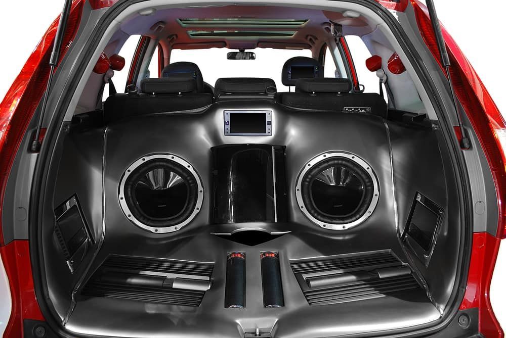 The Trunk of a Red Car With Speakers in It — Clarence Valley Auto Electrical in South Grafton, NSW