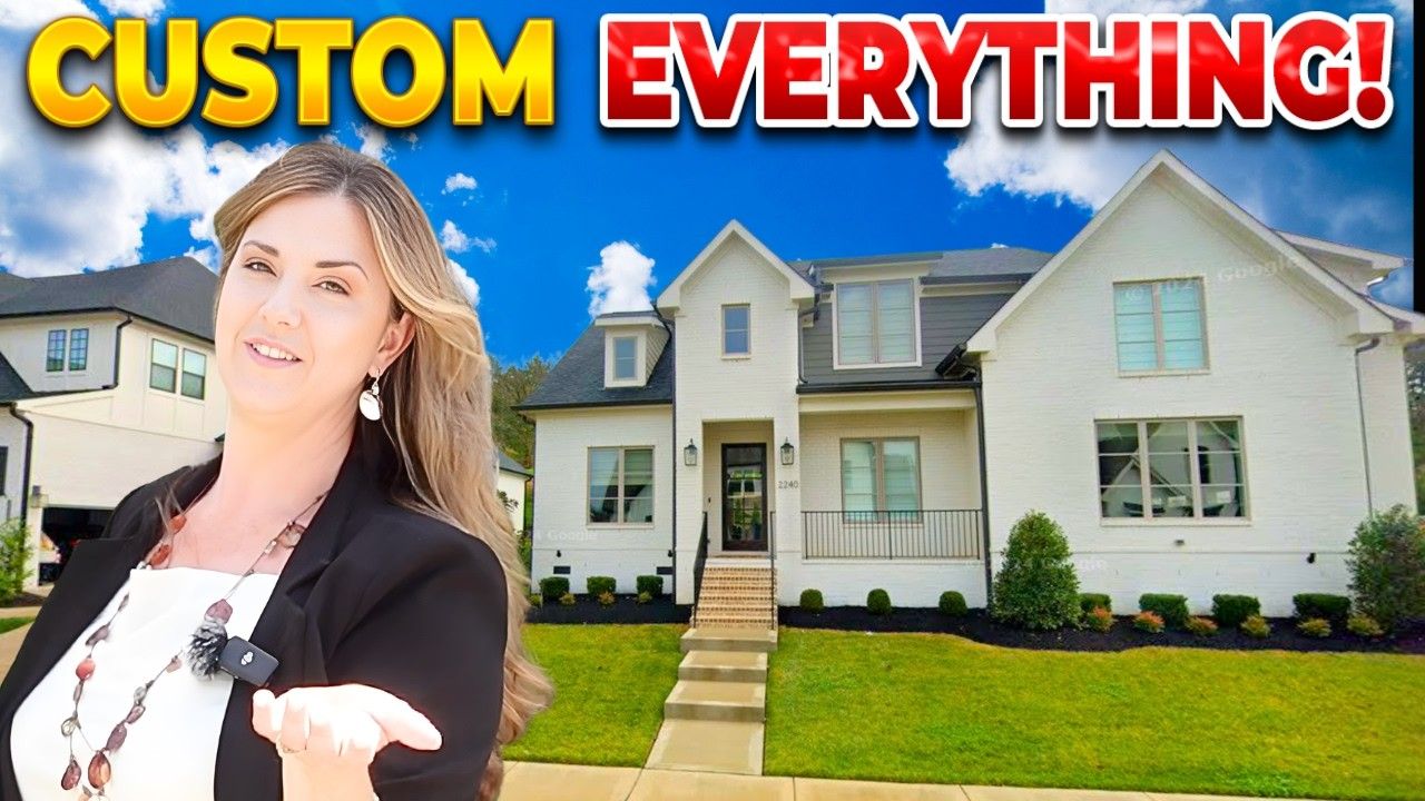 Woman in black blazer standing before a row of houses with bold “CUSTOM EVERYTHING!” text above.