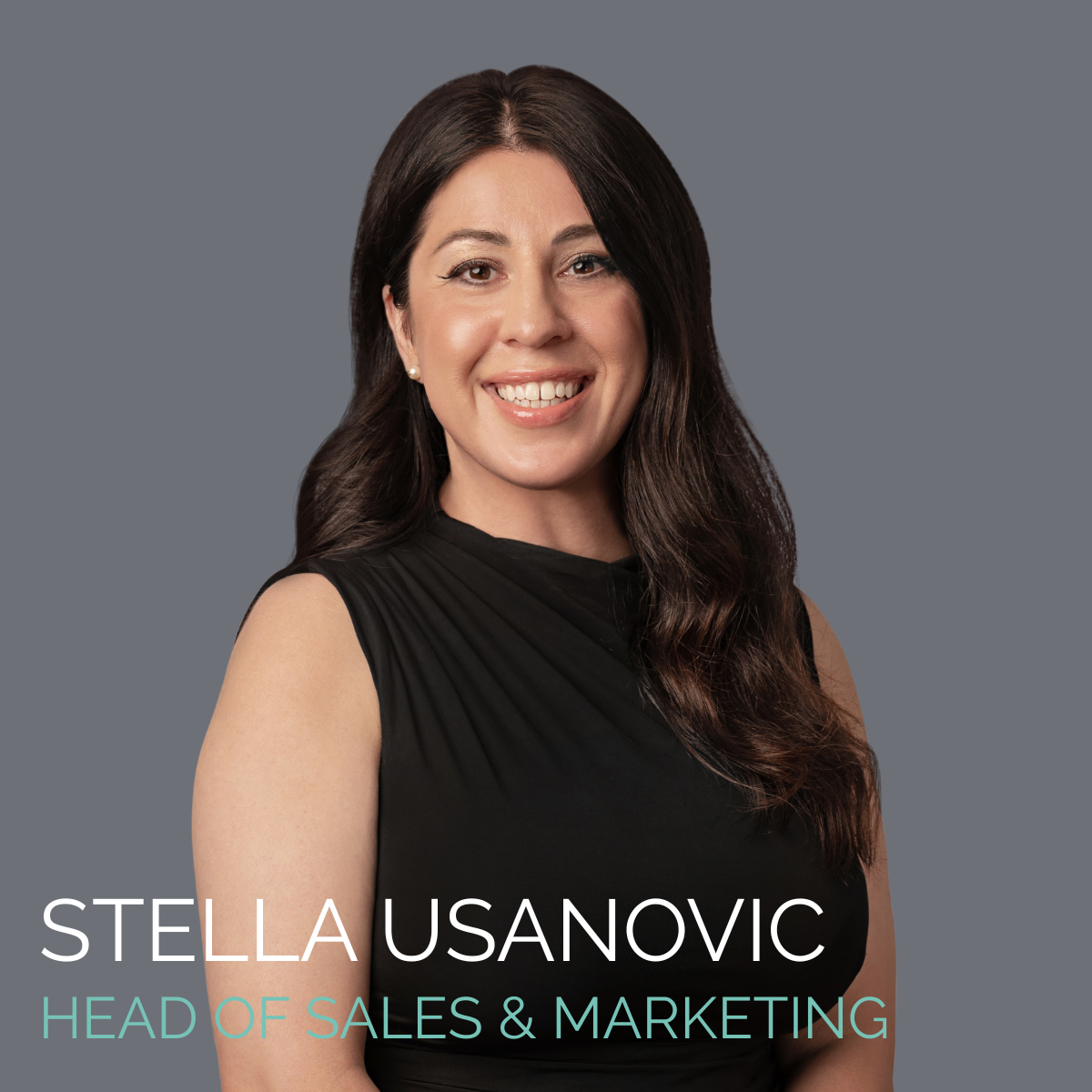 Stella Usanovic, Head of Sales & Marketing, smiles, wearing a black top against a grey background.