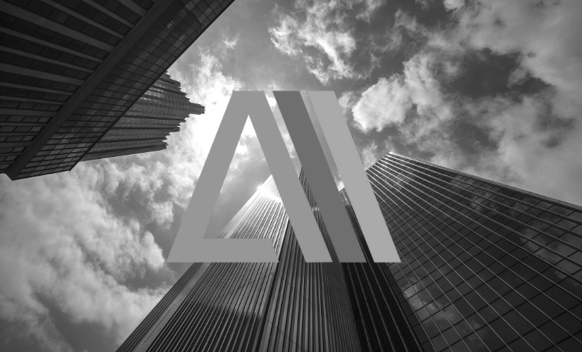 A black and white photo of a city skyline with a logo in the foreground.