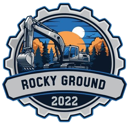 An emblem shows a grey excavator against a forest sunset. Text reads "ROCKY GROUND" and "2022" inside a gear-shaped border.