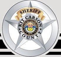 A sheriff 's badge for kit carson county is shown on a white background.