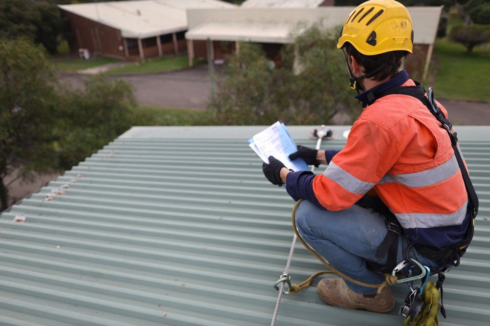 Worker on Roof — Roofing in Goulburn, NSW
