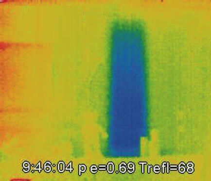 A thermal image of a blue object on a yellow background.