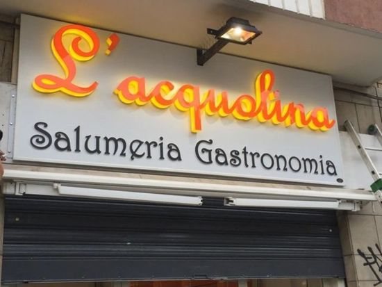 insegna luminosa di salumeria L'Acquolina
