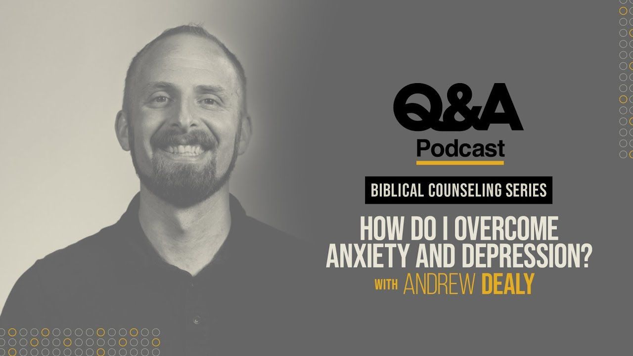 A man with a beard is smiling and talking about how to overcome anxiety and depression.