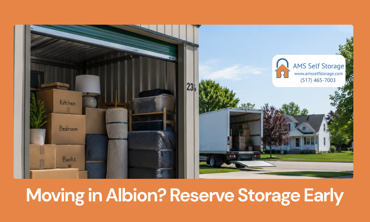 Moving boxes and packed furniture being organized inside a storage unit during a move