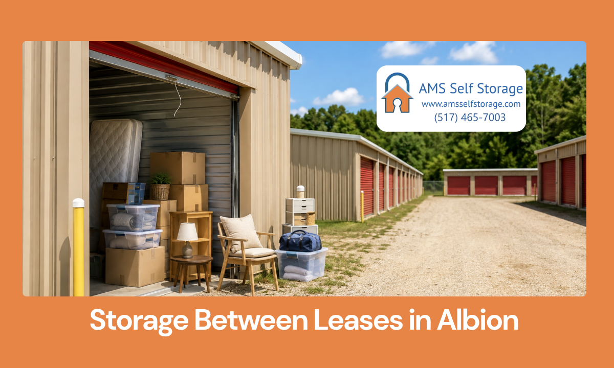 Apartment boxes and furniture staged at storage during a move between leases in Albion