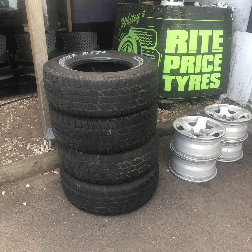 Secondhand Tyres Outside a Store — Rite Price Tyres In Berkeley Vale, NSW