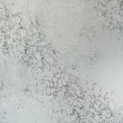 A close up of a white granite counter top with a gray marble texture.