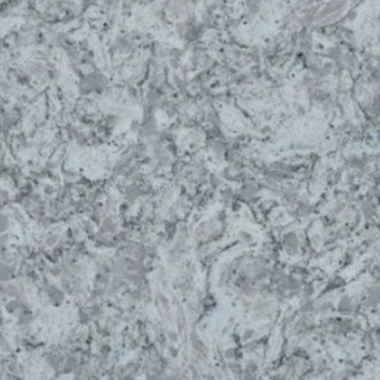 A close up of a gray and white granite counter top.