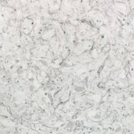 A close up of a white granite counter top.