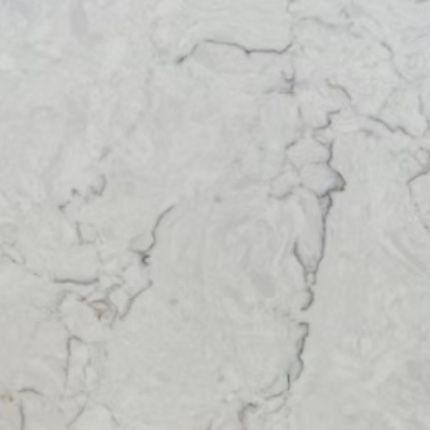 A close up of a white marble counter top.