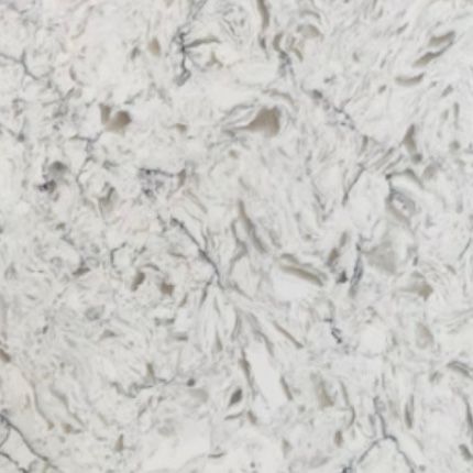 A close up of a white granite counter top with a marble texture.