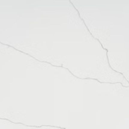 A close up of a white quartz counter top with a gray vein.