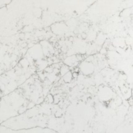 A close up of a white quartz counter top.