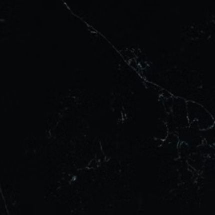 A close up of a black marbled quartz countertop.