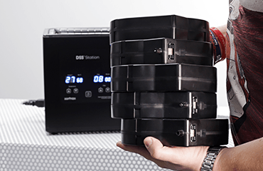 Engineer holding5 spool of filament cartridge