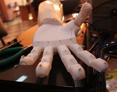 a 3d printed white color prosthetics hand