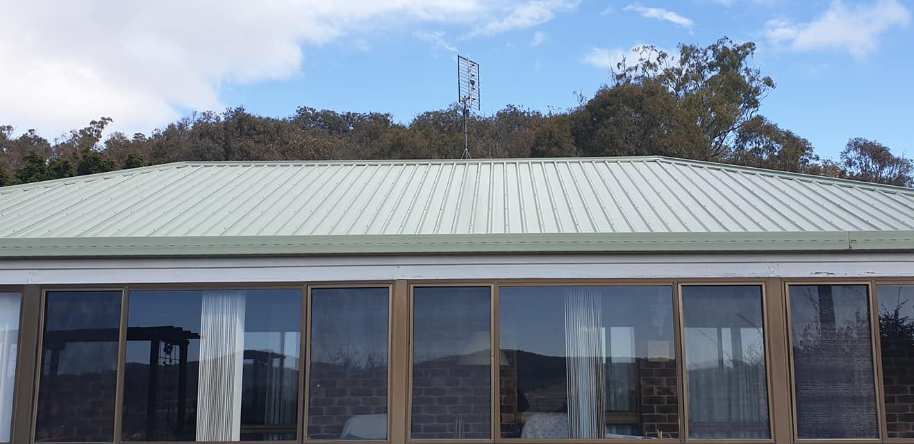 House With a Green Roof — Steve Oberhardt Roof Restorations & Repairs in Westbrook, QLD