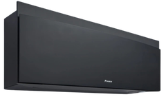 Een zwarte airconditioner staat op een wit oppervlak.
