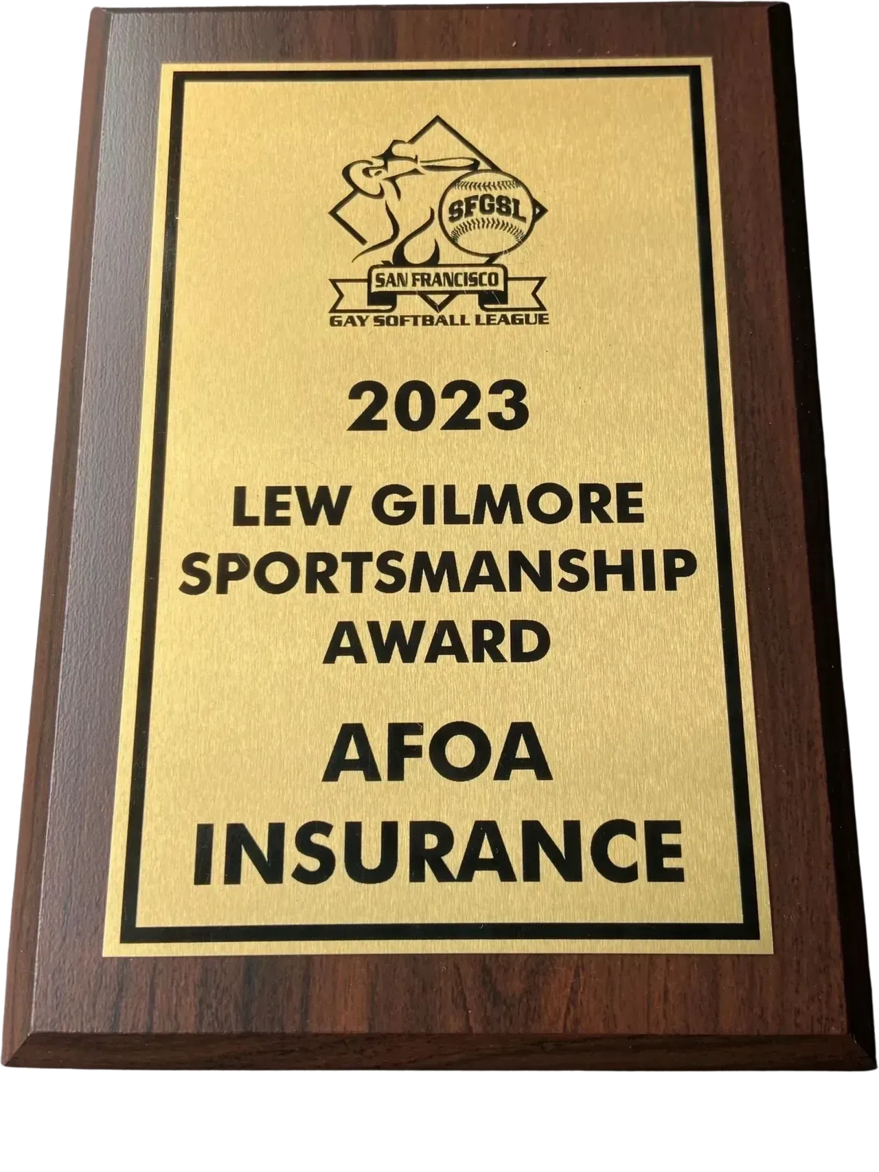 Wood plaque reading “2023 Lew Gilmore Sportsmanship Award” and “AFOA Insurance” on gold plate.
