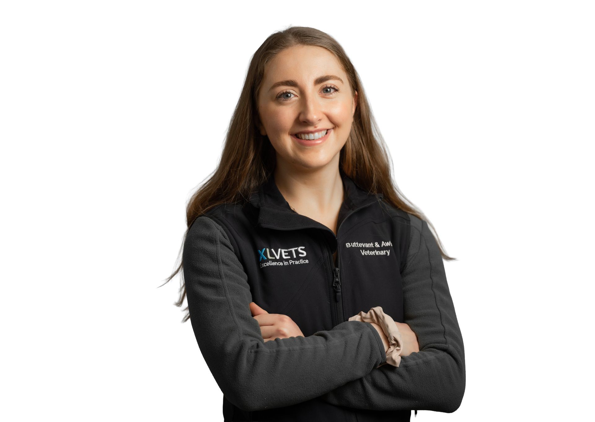Smiling person with crossed arms in a black shirt on a white background