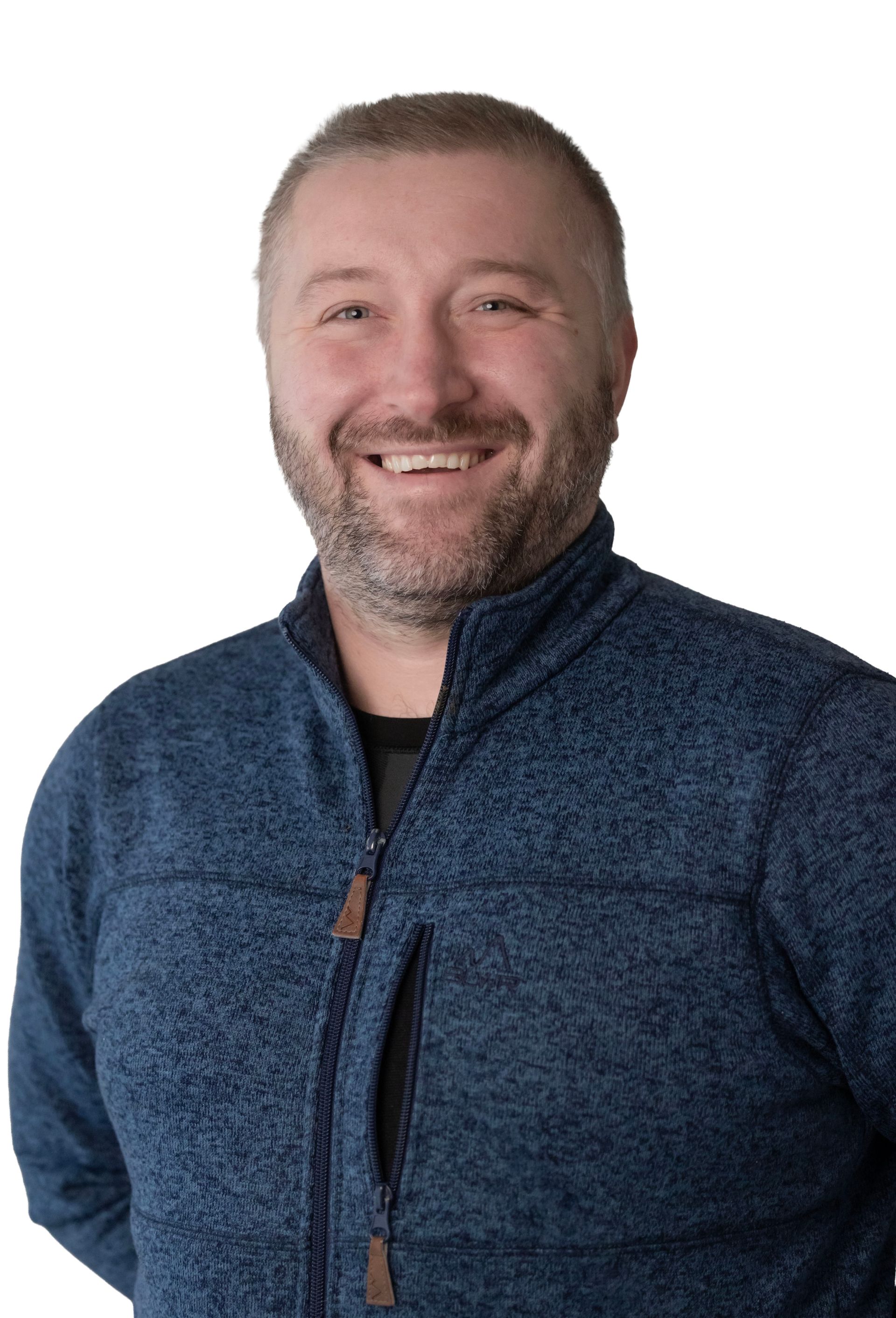 Smiling man in a blue textured sweater on a white background