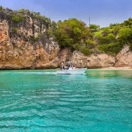 Crocus, famous jumping rock in Anguilla accessible by boat by our Power Catamaran Charters with Arawak charters