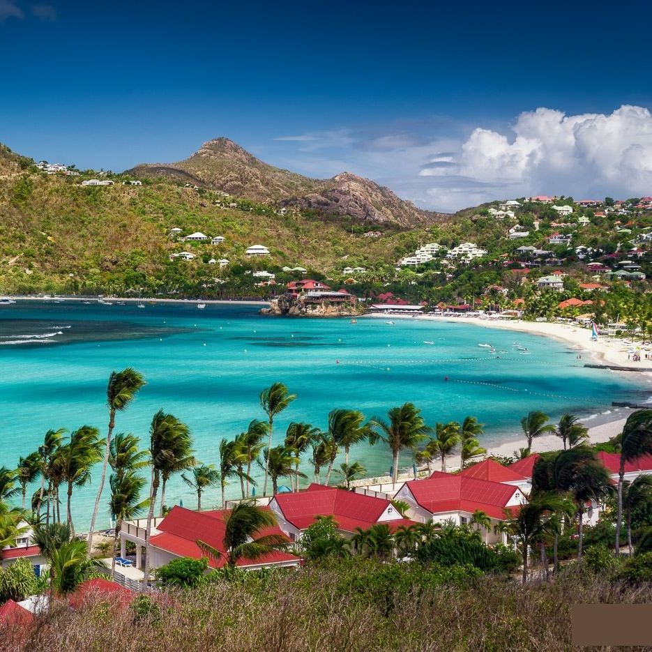 Saint Jean Beach with airport of Saint Barth behind it