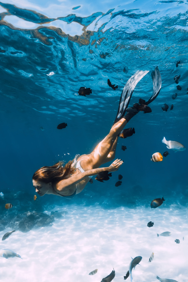 Snorkeling in crystal sea water in Carribean.