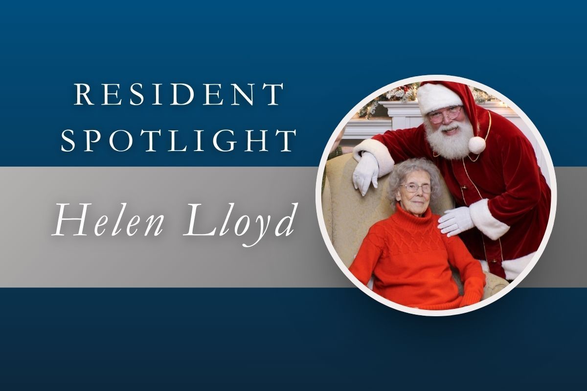 Resident spotlight on Helen Lloyd; Helen in red sweater with Santa, blue and silver background.
