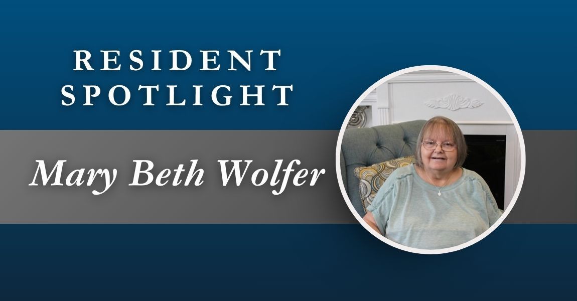 Resident Spotlight banner with the name Mary Beth Wolfer and a circular portrait on a blue background