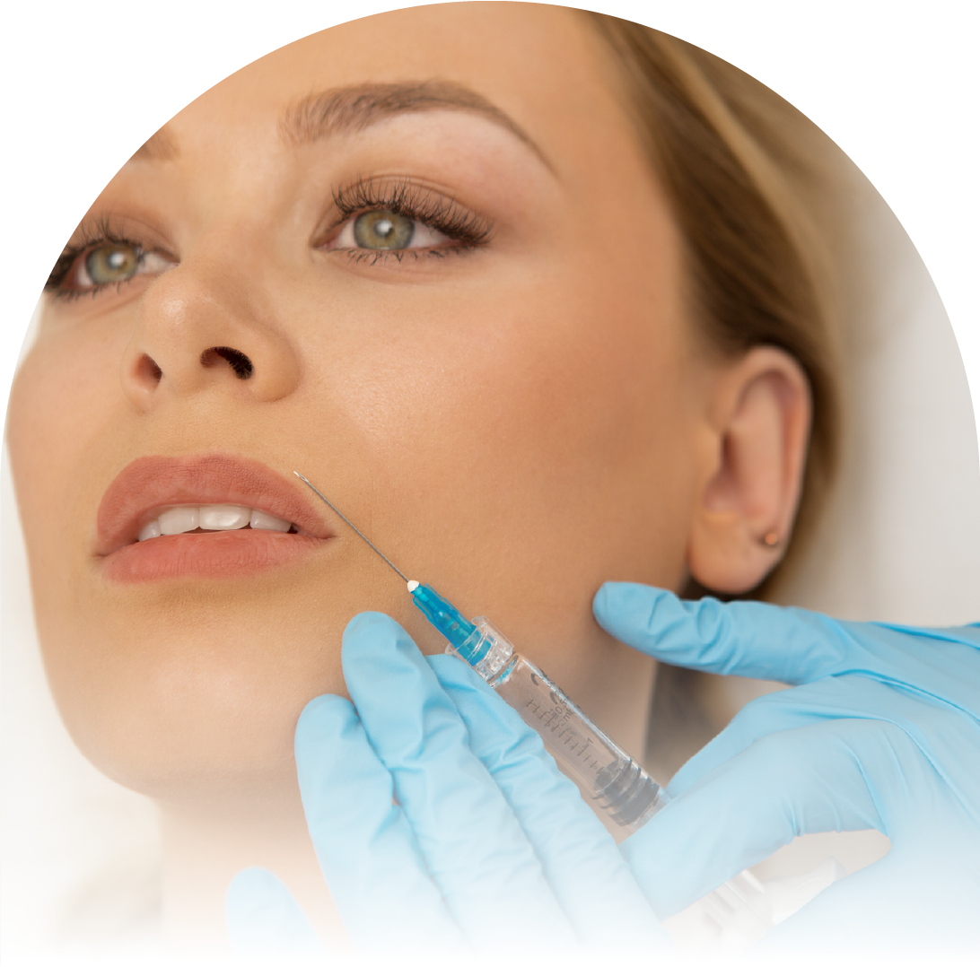 A woman is getting a botox injection in her face