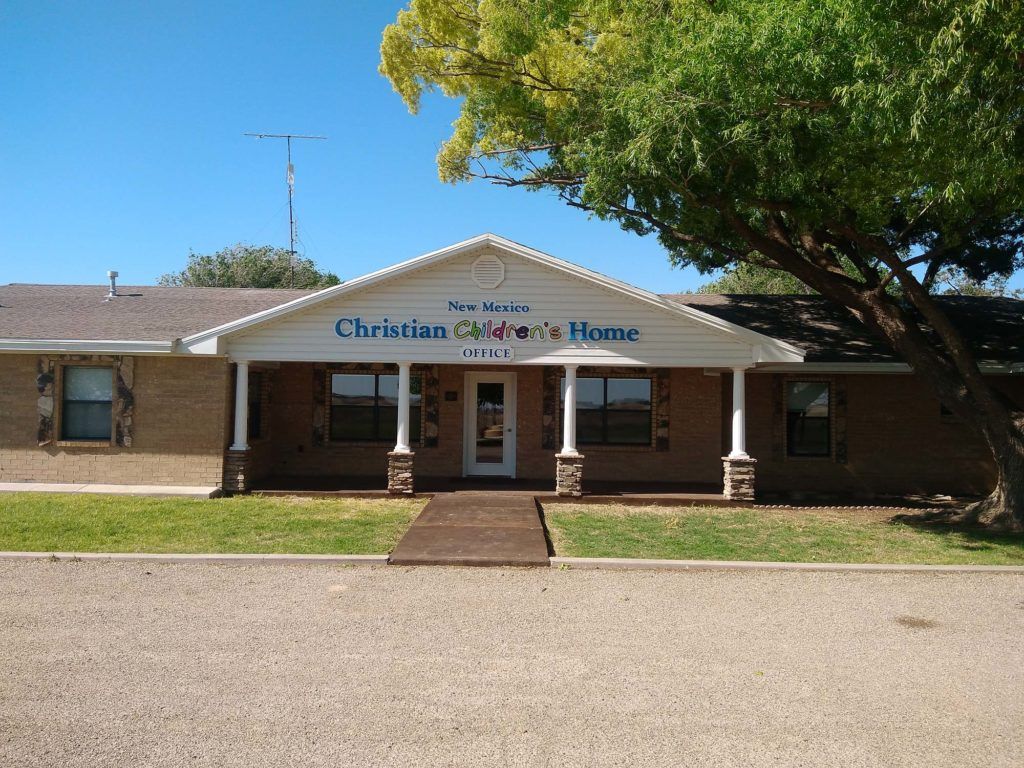 A house with a sign that says christian children 's home