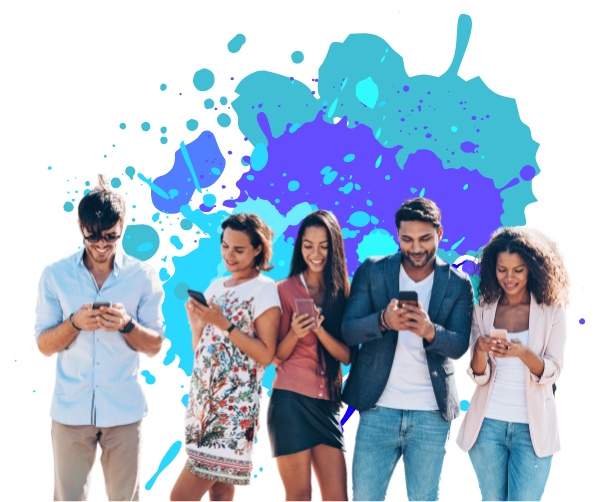 a group of people standing next to each other looking at their phones
