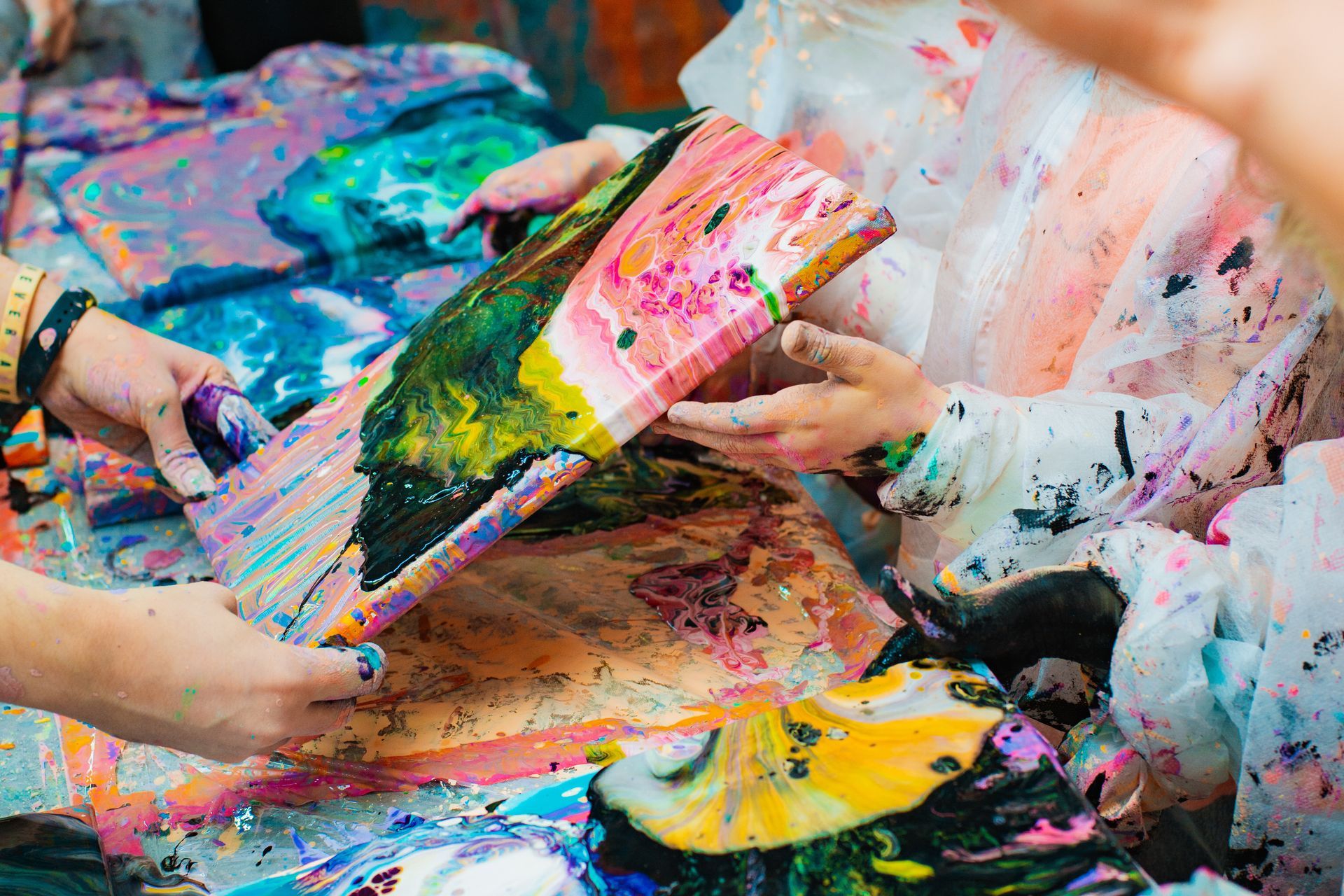 a painting of a colorful swirl of paint